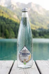THEONI glazen literfles plat